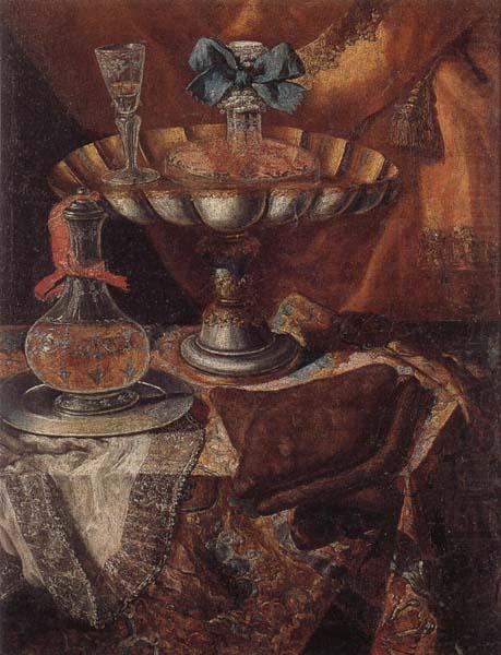 Still life of a wine glass and bottle in a parcel gilt tazza together with a glass decanter on a pewter dish upon a draped tabletop, unknow artist